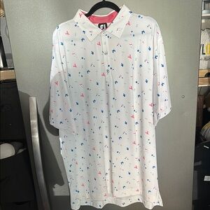 Stylish White Polo Shirt with Blue and Pink Patterns